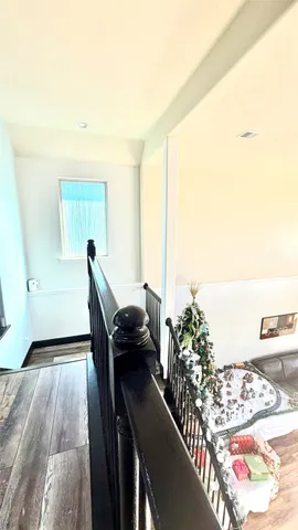 a kitchen with a stove and a chandelier