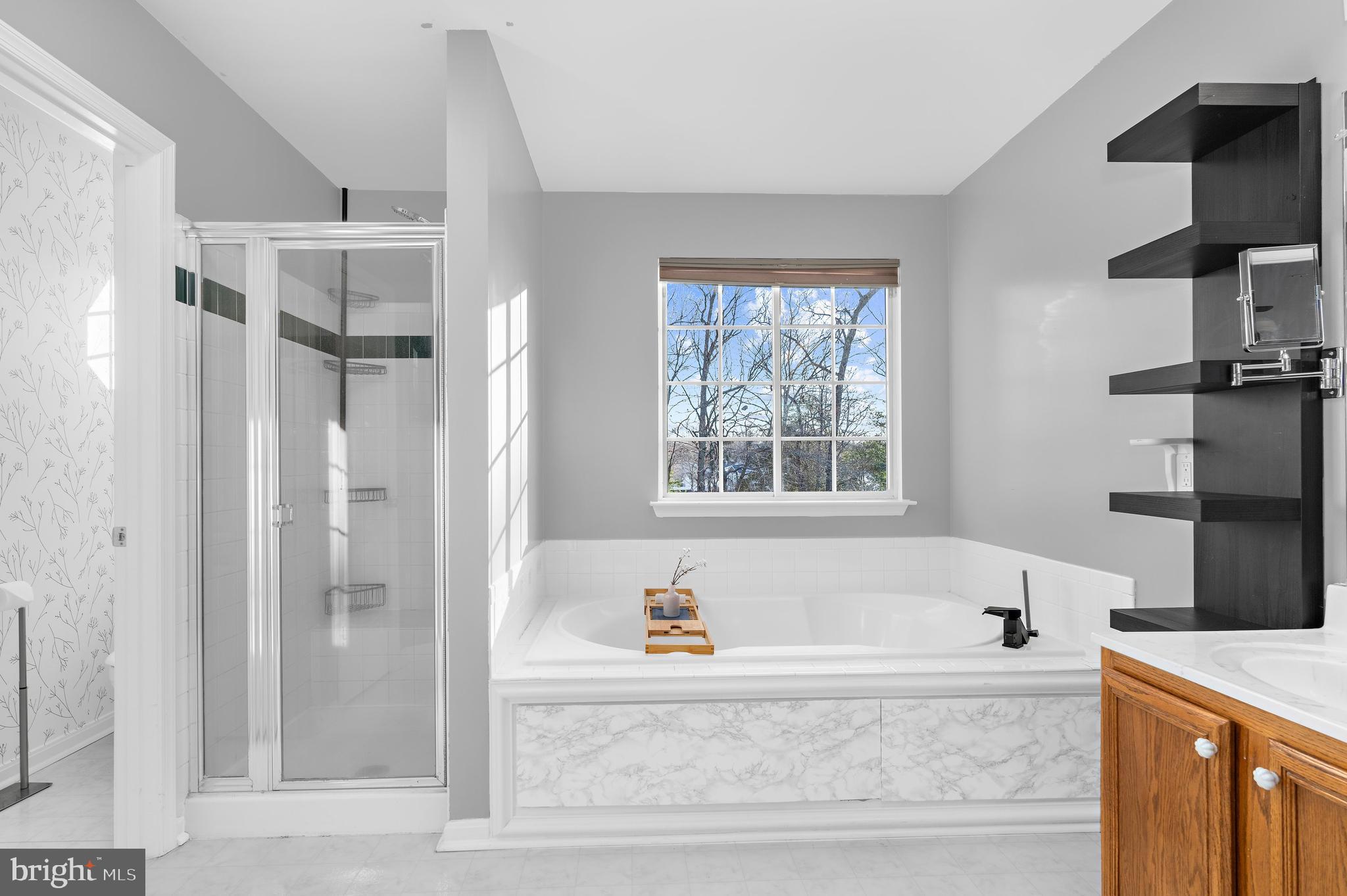 13159 Partridge Berry Court Waldorf, MD 20601 - Photo 31 of 63 a bathroom with bathtub and a shower