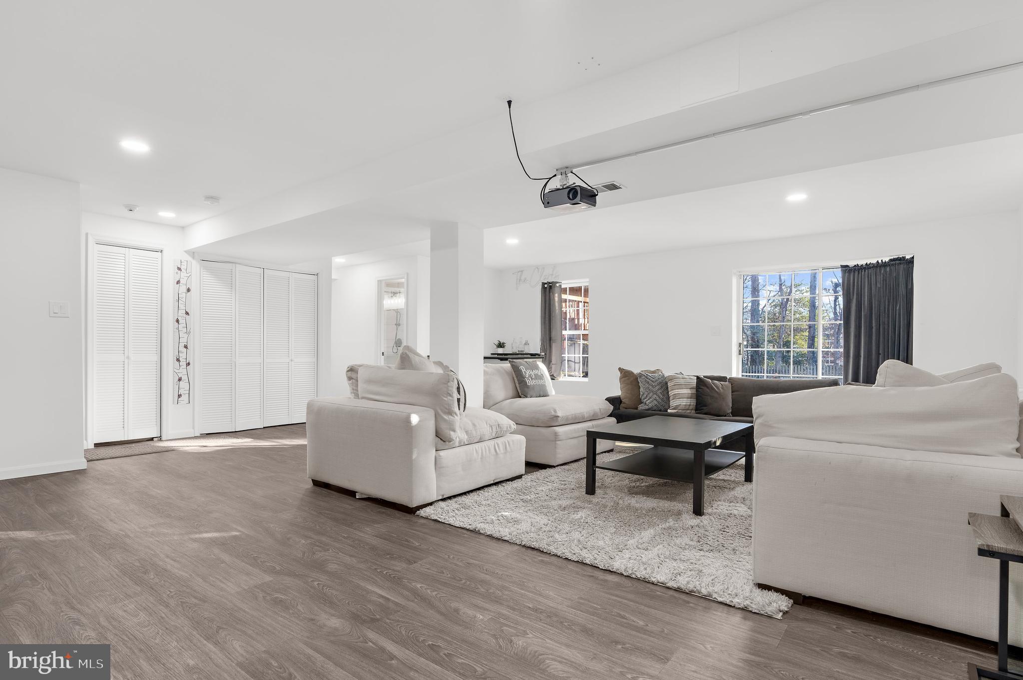 13159 Partridge Berry Court Waldorf, MD 20601 - Photo 40 of 63 a living room with furniture and a window