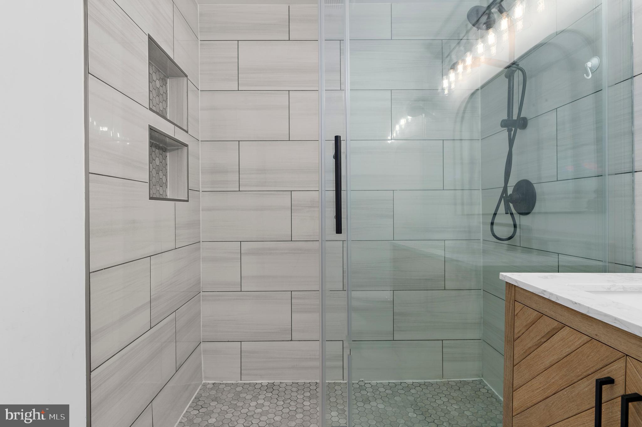 13159 Partridge Berry Court Waldorf, MD 20601 - Photo 45 of 63 a bathroom with a shower