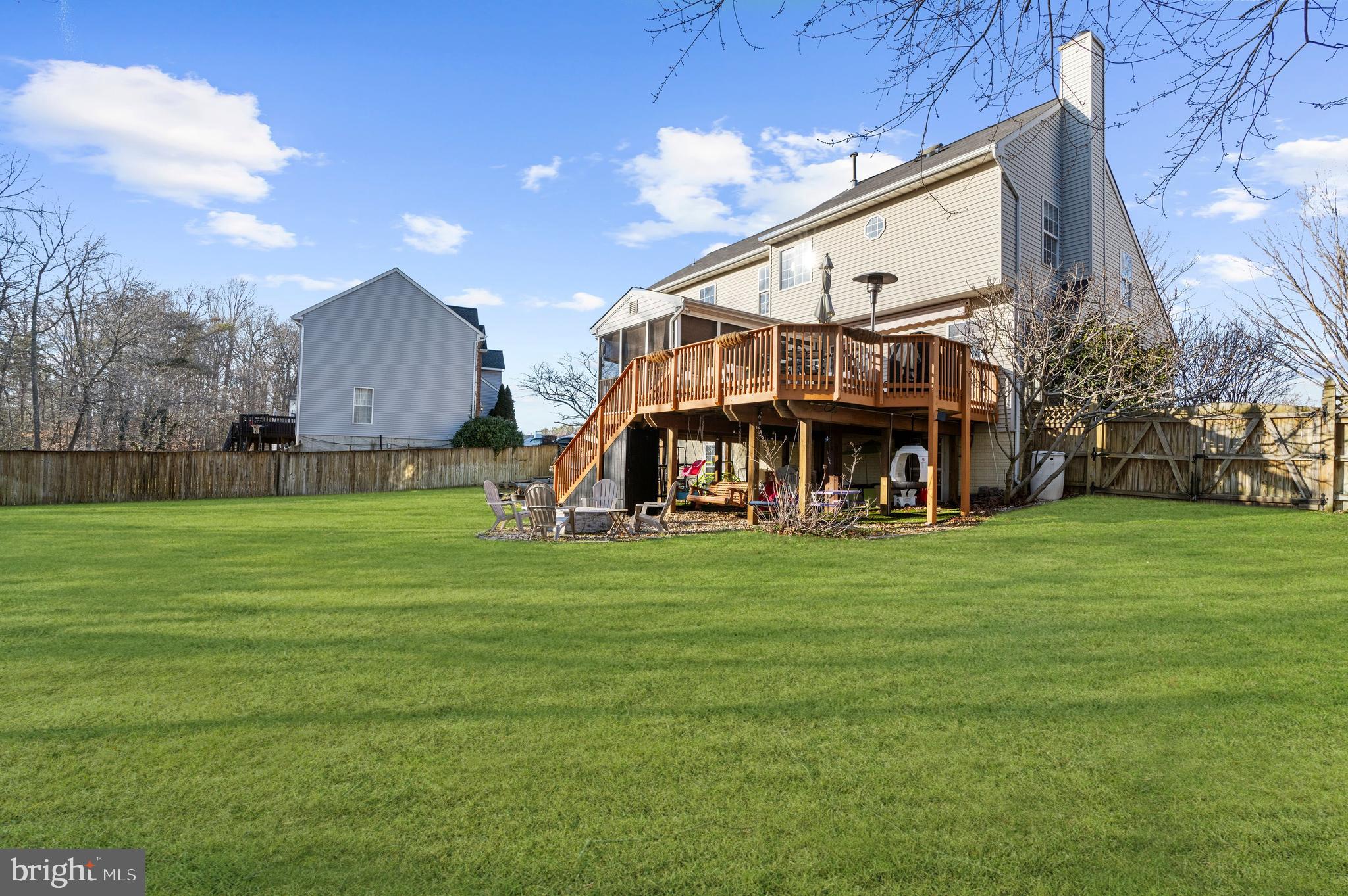 13159 Partridge Berry Court Waldorf, MD 20601 - Photo 51 of 63 a view of a big house with a big yard and large trees