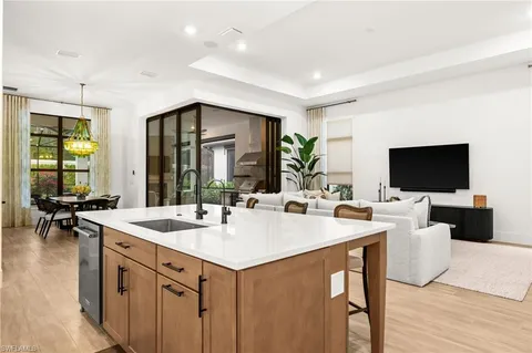 a kitchen with stainless steel appliances granite countertop a stove and a refrigerator