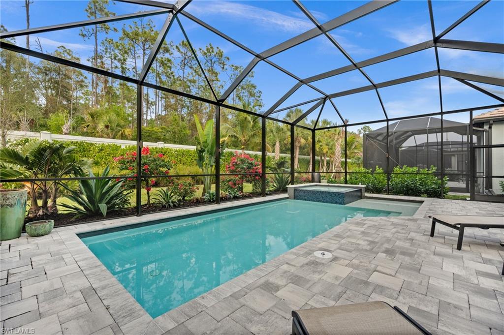 9565 Caymas Terrace Naples, FL 34114 - Photo 42 of 47 a view of yard with a patio
