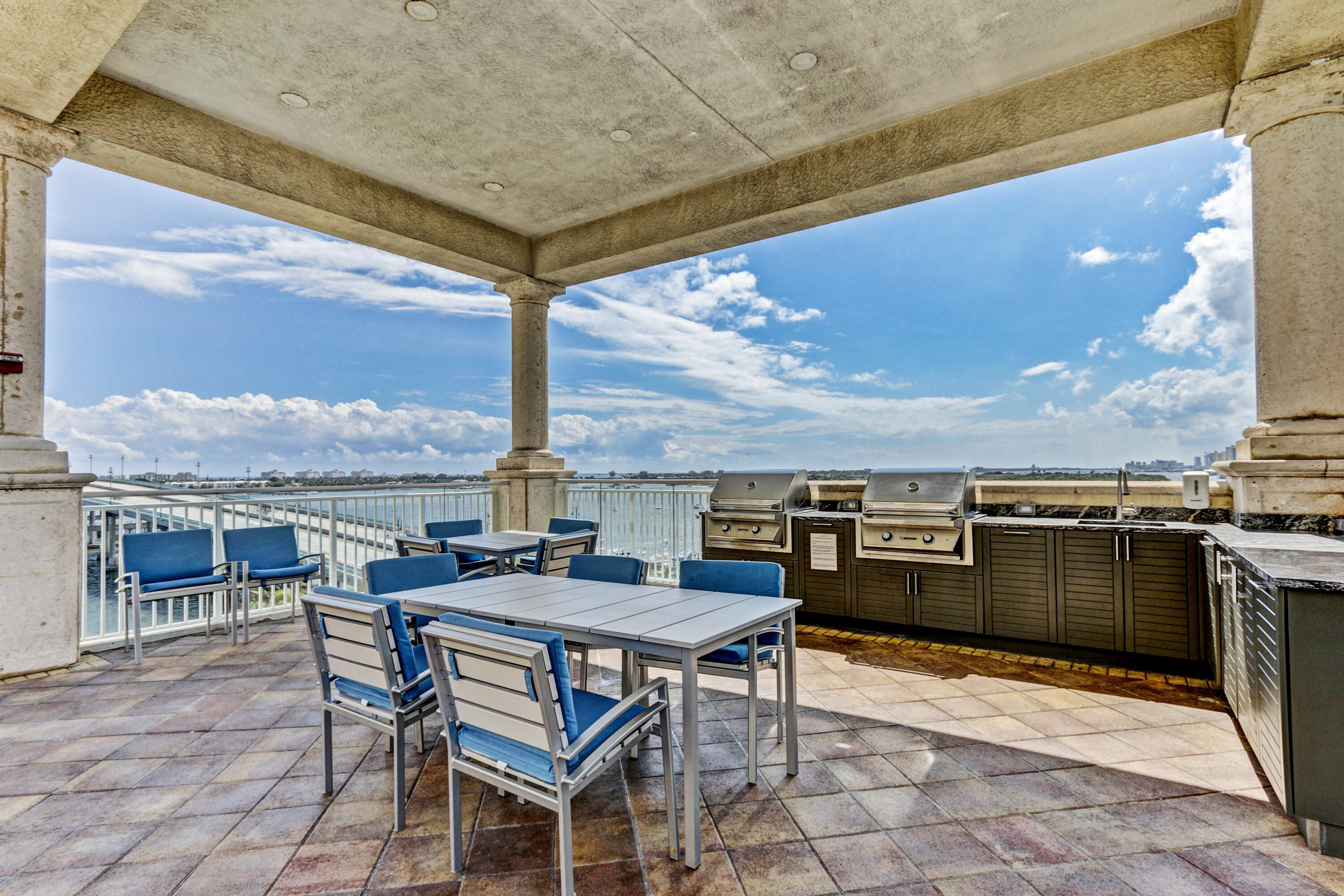 2640 Lake Shore Drive, Unit 115 Riviera Beach, FL 33404 - Photo 2 of 59 Barbecue Area with Intercoastal View