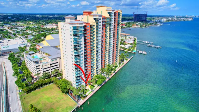 a kitchen with a sink and large window