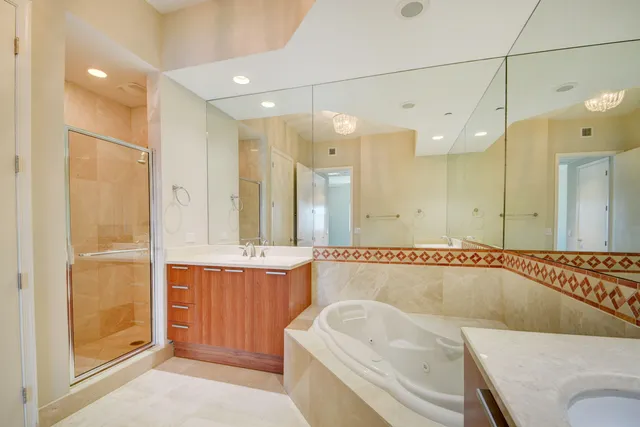 a bathroom with a granite countertop sink mirror and a
