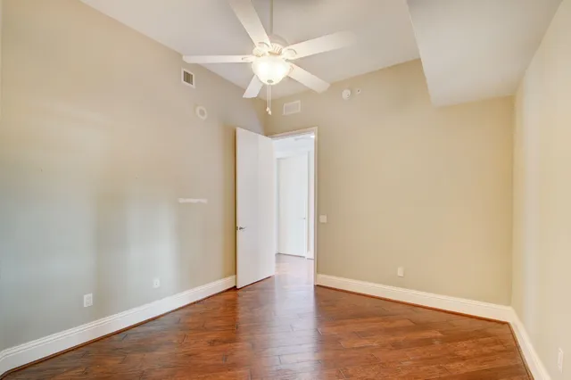 a view of a swimming pool with a lounge chairs