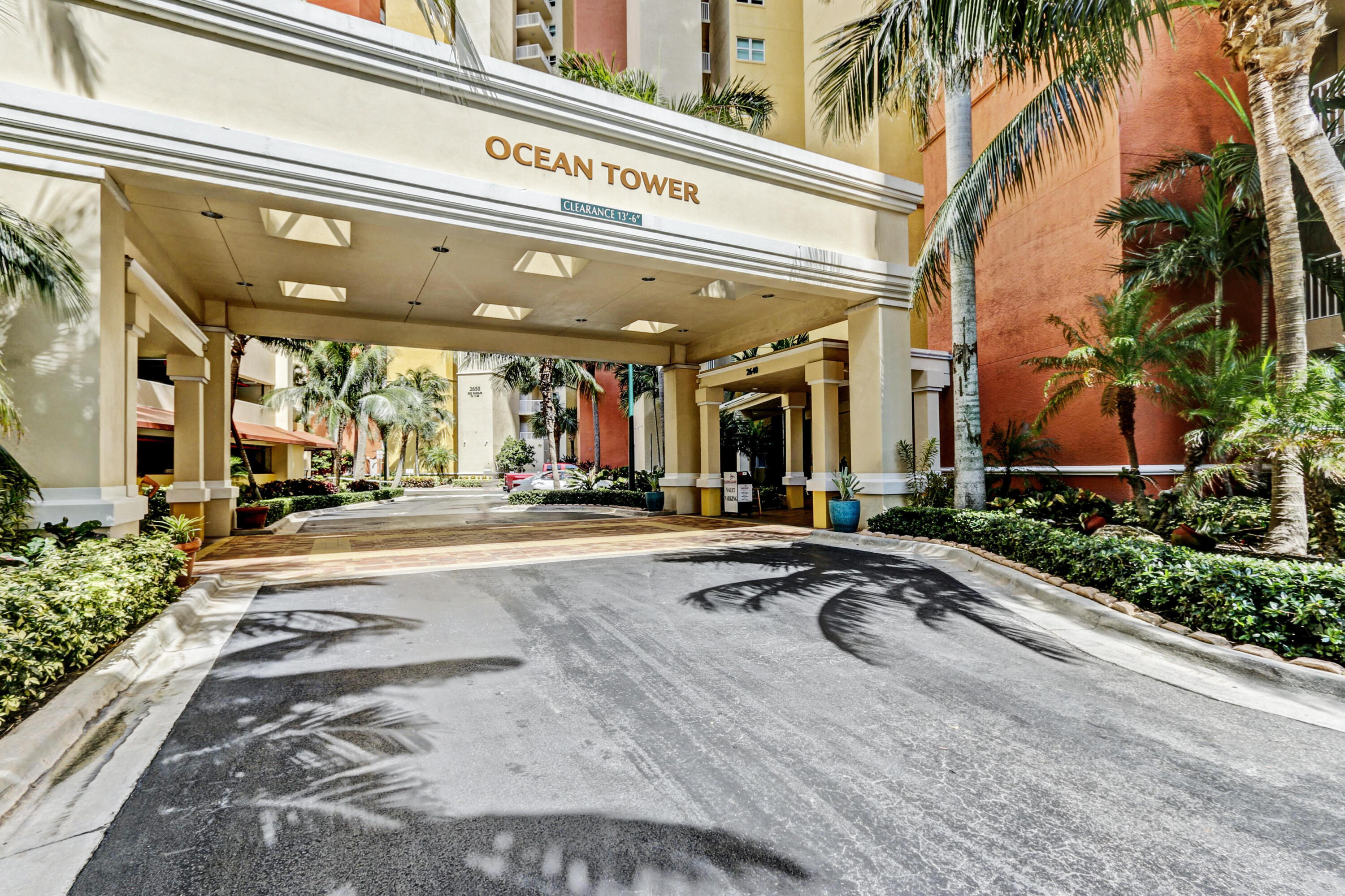 2640 Lake Shore Drive, Unit 115 Riviera Beach, FL 33404 - Photo 4 of 59 a building exterior with furniture