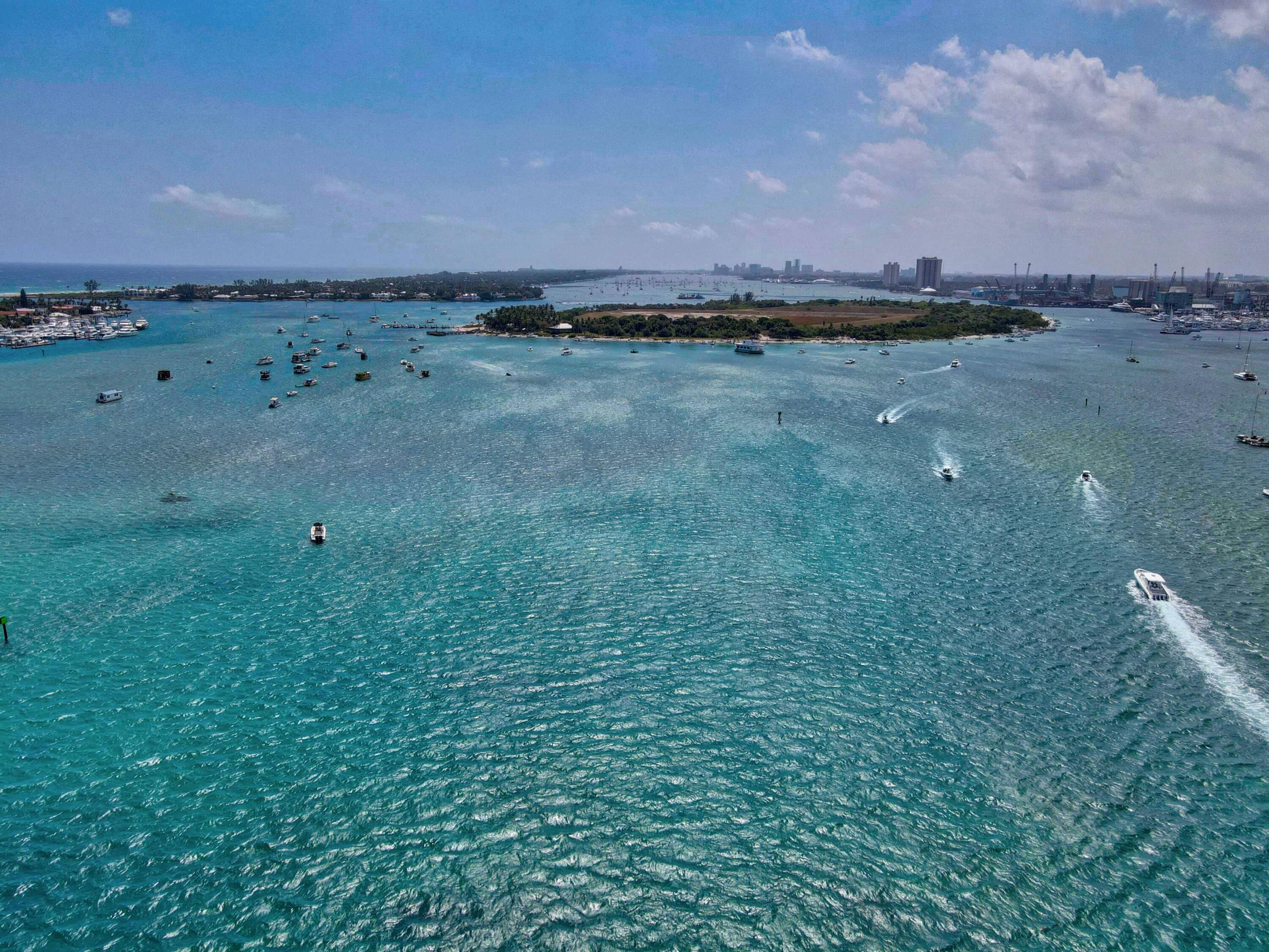2640 Lake Shore Drive, Unit 115 Riviera Beach, FL 33404 - Photo 56 of 59 a view of a field with an ocean