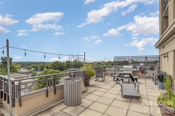a view of a terrace with furniture