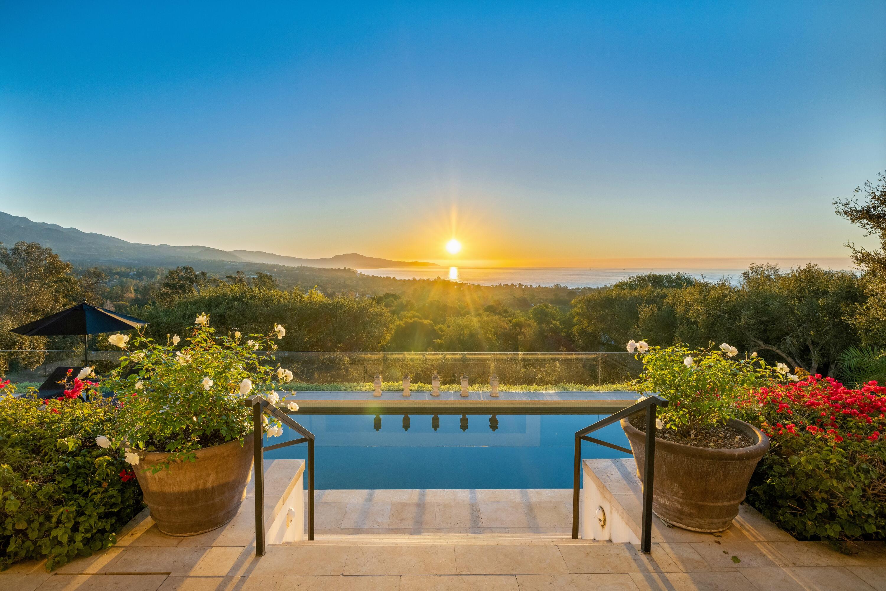 a view of a chairs and table on the terrace