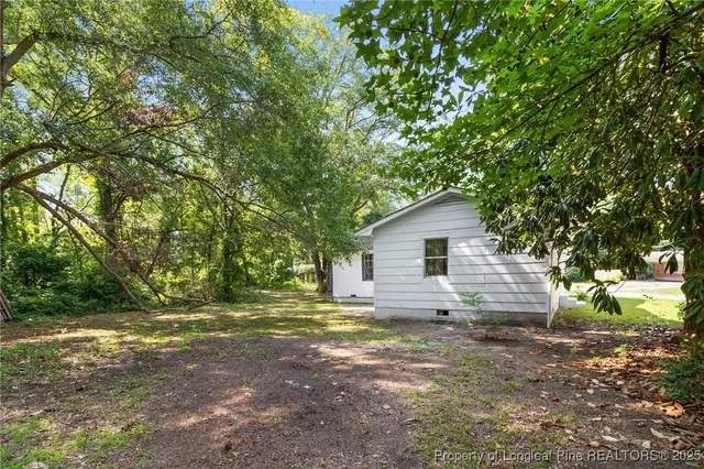 a view of backyard of house