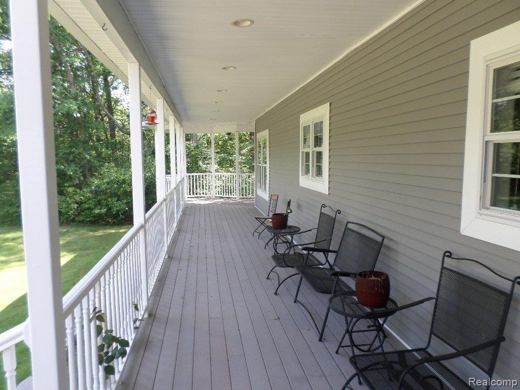 3577 Hannaman Road Columbiaville, MI 48421 - Photo 2 of 28 Covered Front Porch.jpg