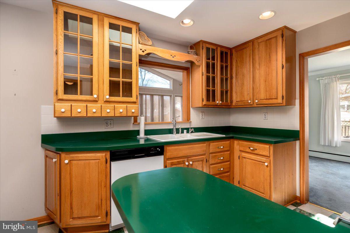 162 Sillery Bay Road Pasadena, MD 21122 - Photo 19 of 41 a kitchen with stainless steel appliances granite countertop a sink and cabinets