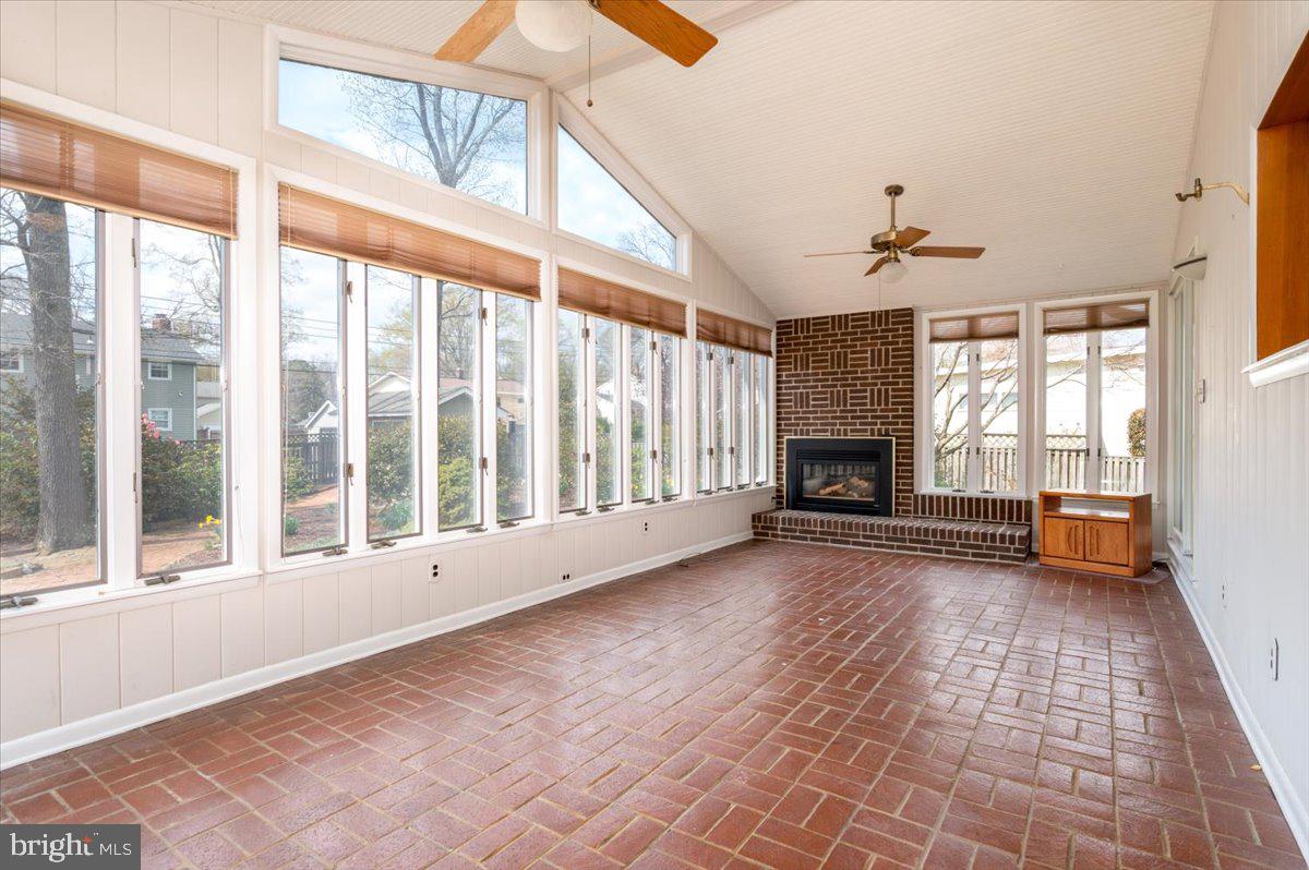162 Sillery Bay Road Pasadena, MD 21122 - Photo 20 of 41 a view of an empty room with a fireplace and a window
