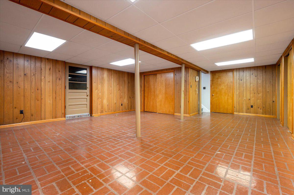 162 Sillery Bay Road Pasadena, MD 21122 - Photo 31 of 41 a view of an empty room with wooden floor