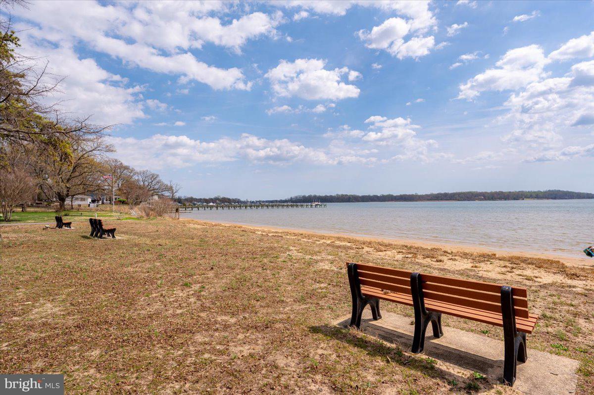 162 Sillery Bay Road Pasadena, MD 21122 - Photo 39 of 41 a view of a lake with outdoor seating