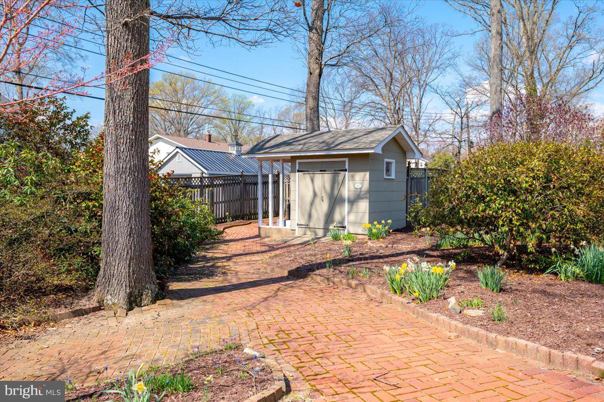 162 Sillery Bay Road Pasadena, MD 21122 - Photo 9 of 41 a front view of a house with a yard and potted plants