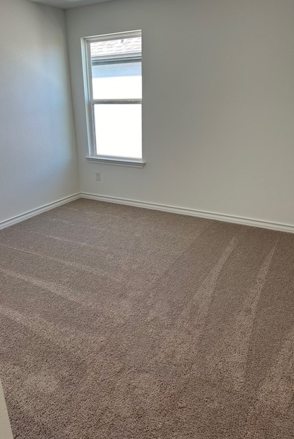 125 Watkinville Road Hutto, TX 78634 - Photo 13 of 17 an empty room with a window