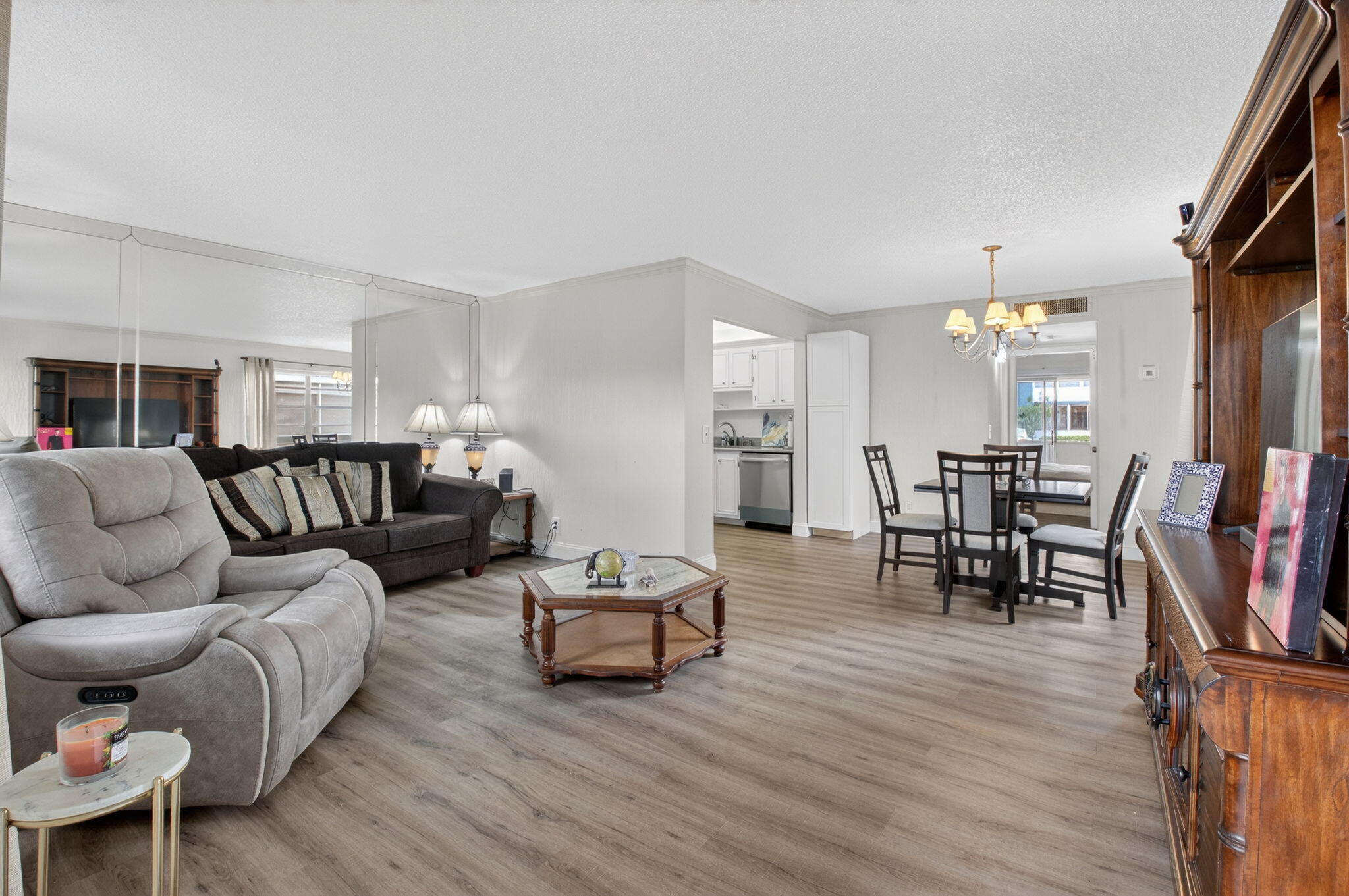 111 Normandy Lane Delray Beach, FL 33484 - Photo 2 of 14 a living room with furniture and a wooden floor