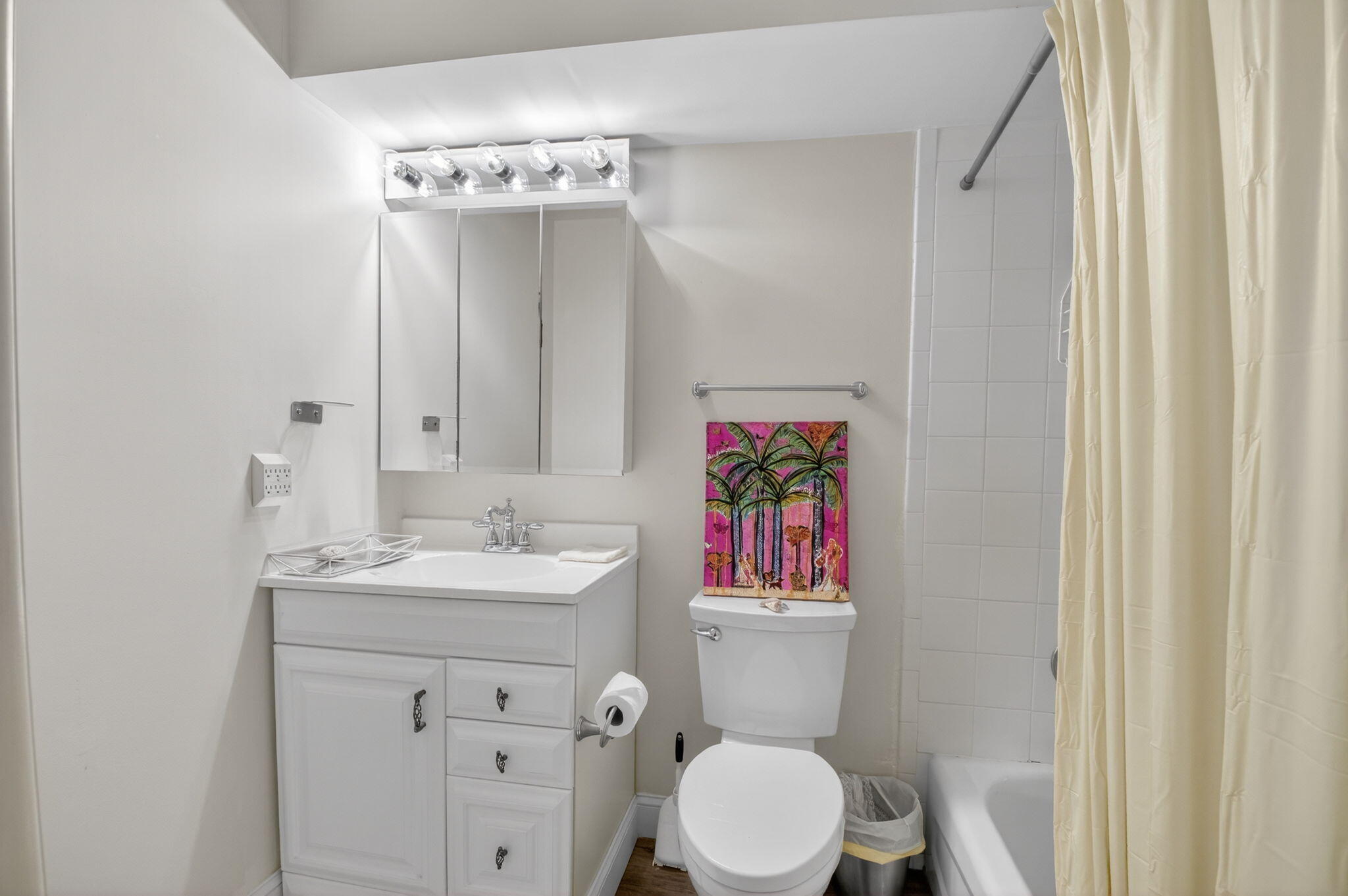 111 Normandy Lane Delray Beach, FL 33484 - Photo 6 of 14 a bathroom with a sink vanity mirror and toilet