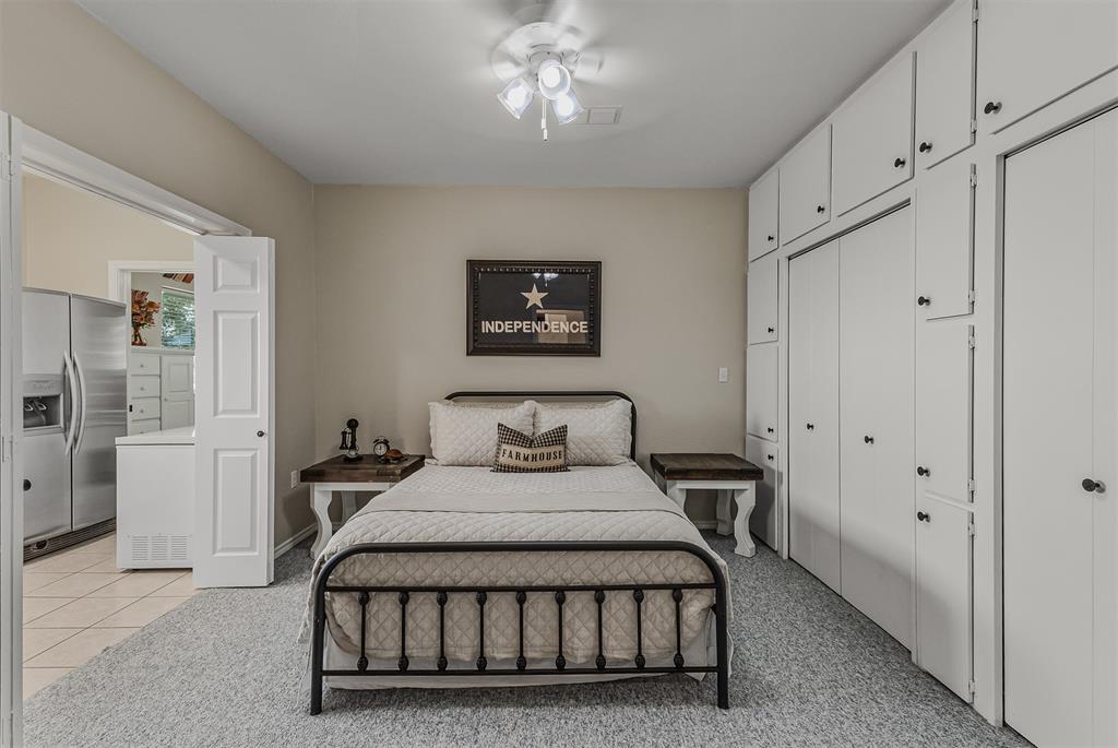 339 Colwell Road Forestburg, TX 76239 - Photo 16 of 31 Bedroom with tons of storage and opens to utility room of 339 Colwell Rd in Forestburg, TX