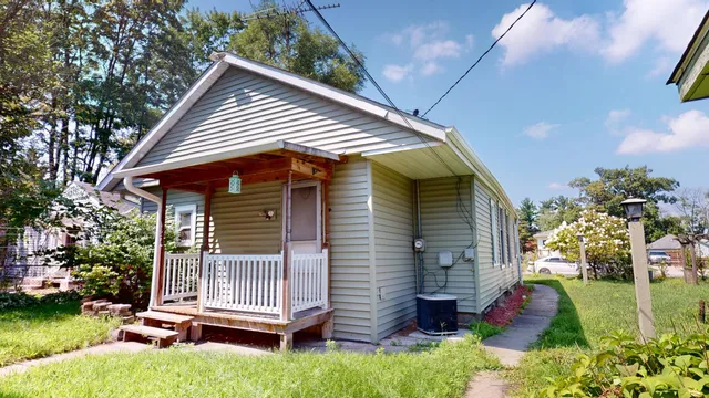 a front view of house with a yard