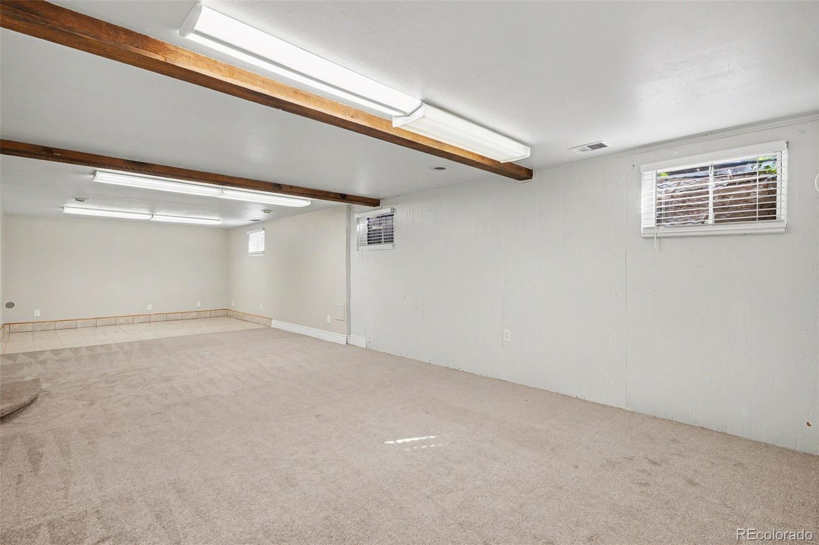 3217 South Stuart Street Denver, CO 80236 - Photo 19 of 29 a view of an empty room