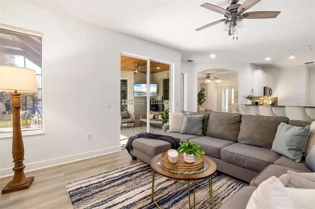 a kitchen with granite countertop a sink and steel appliances
