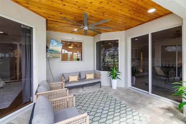 a view of a swimming pool with a patio