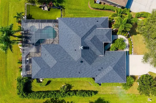 a view of a swimming pool and an outdoor space