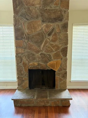 a living room with a fireplace
