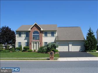 401 Augusta Drive East Reading, PA 19608 - Photo 1 of 10 a front view of a house with a yard