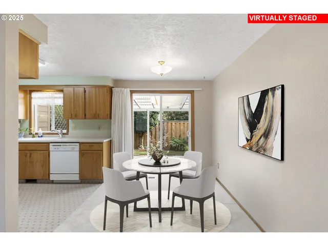a kitchen with a refrigerator and a sink