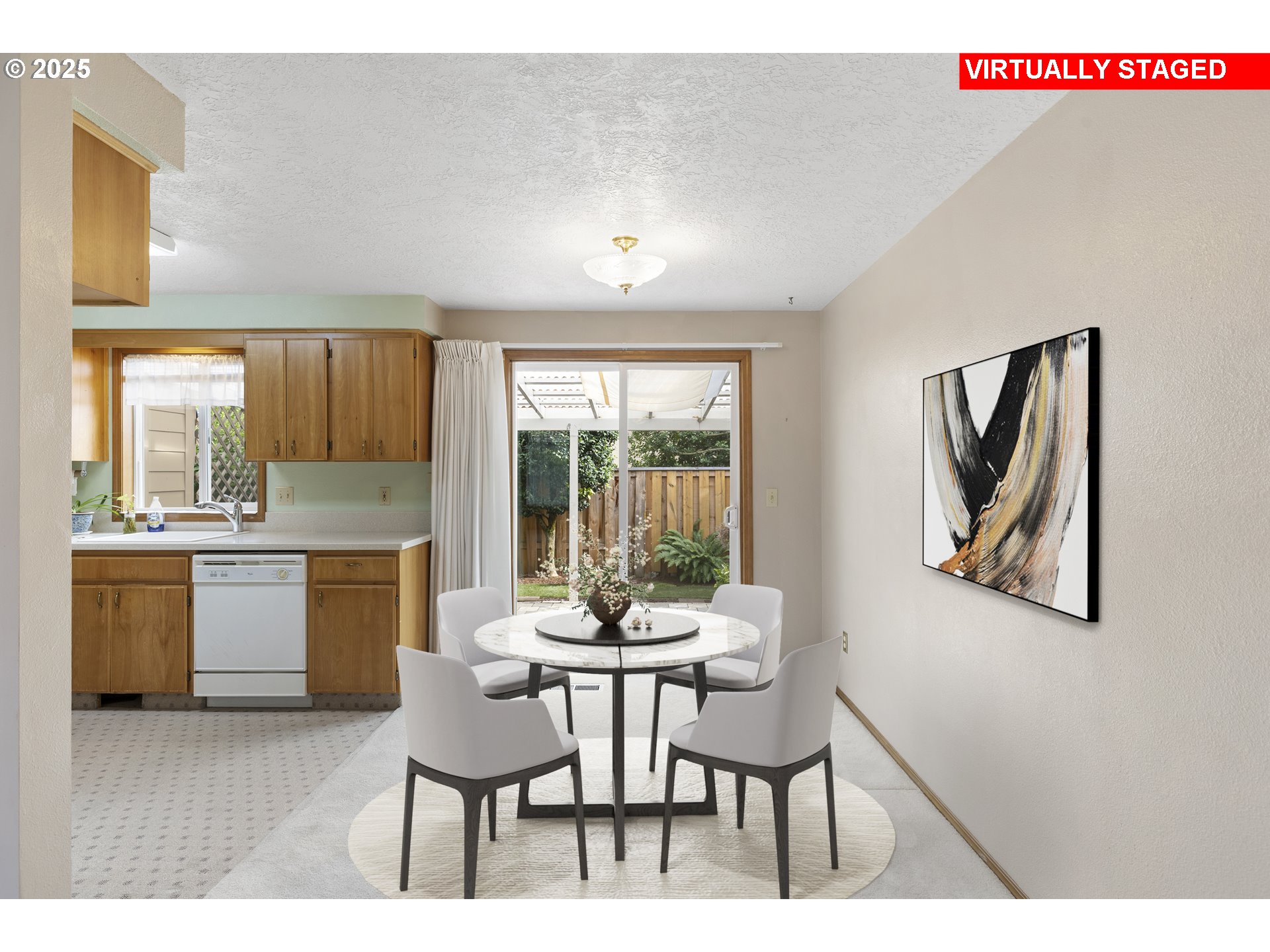 1609 Johnson Drive Newberg, OR 97132 - Photo 14 of 41 a kitchen with a table chairs refrigerator and cabinets
