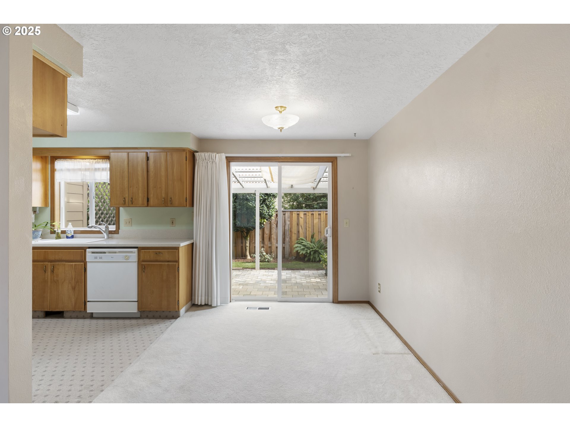 1609 Johnson Drive Newberg, OR 97132 - Photo 15 of 41 a kitchen with a refrigerator and a sink