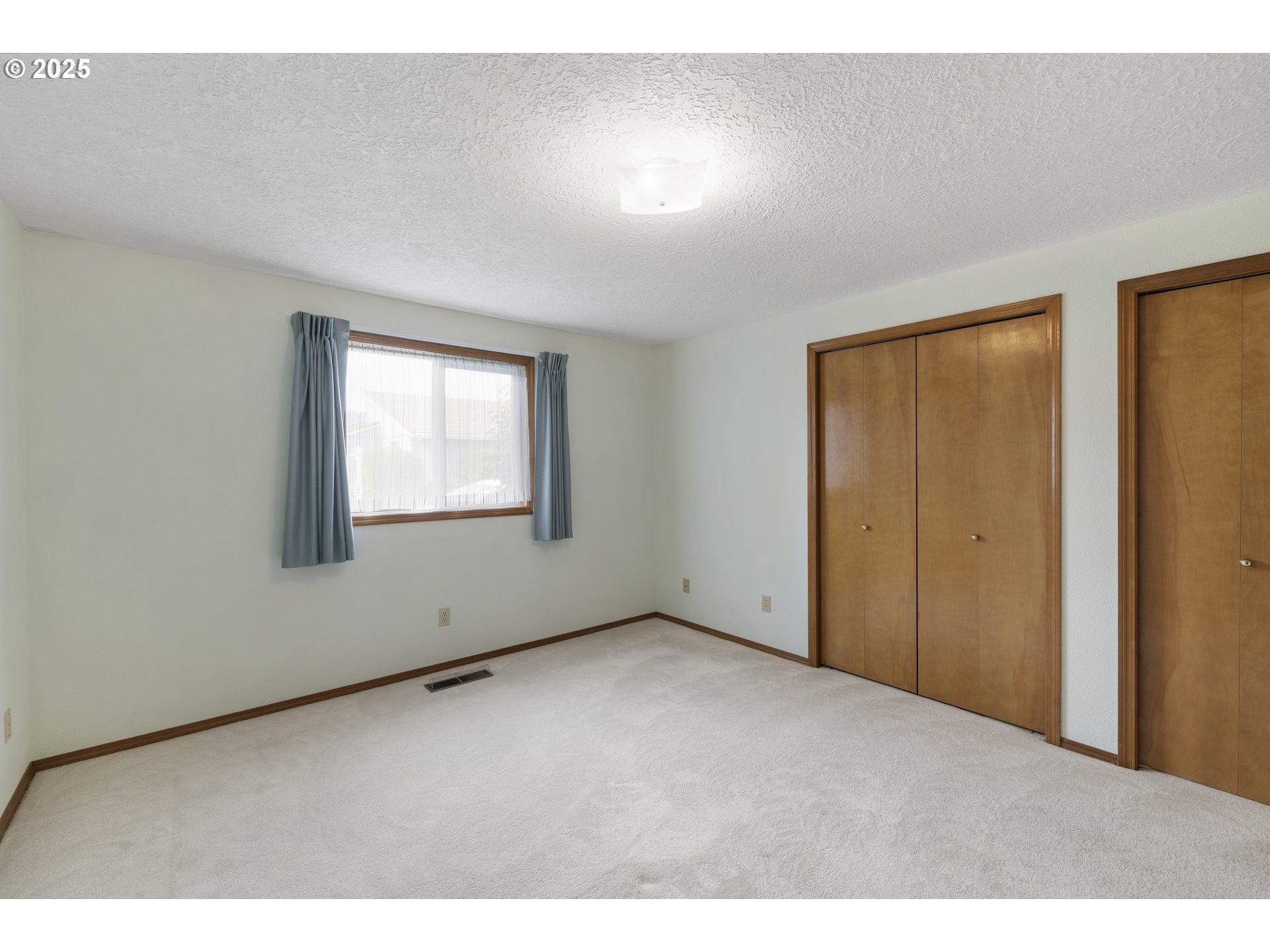 1609 Johnson Drive Newberg, OR 97132 - Photo 29 of 41 a view of an empty room with a window