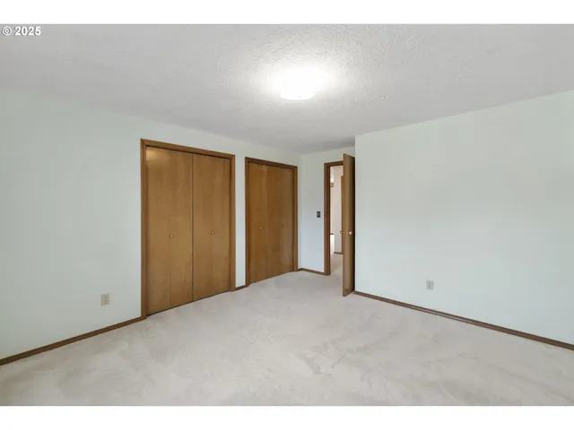 a bathroom with a sink toilet a mirror and shower
