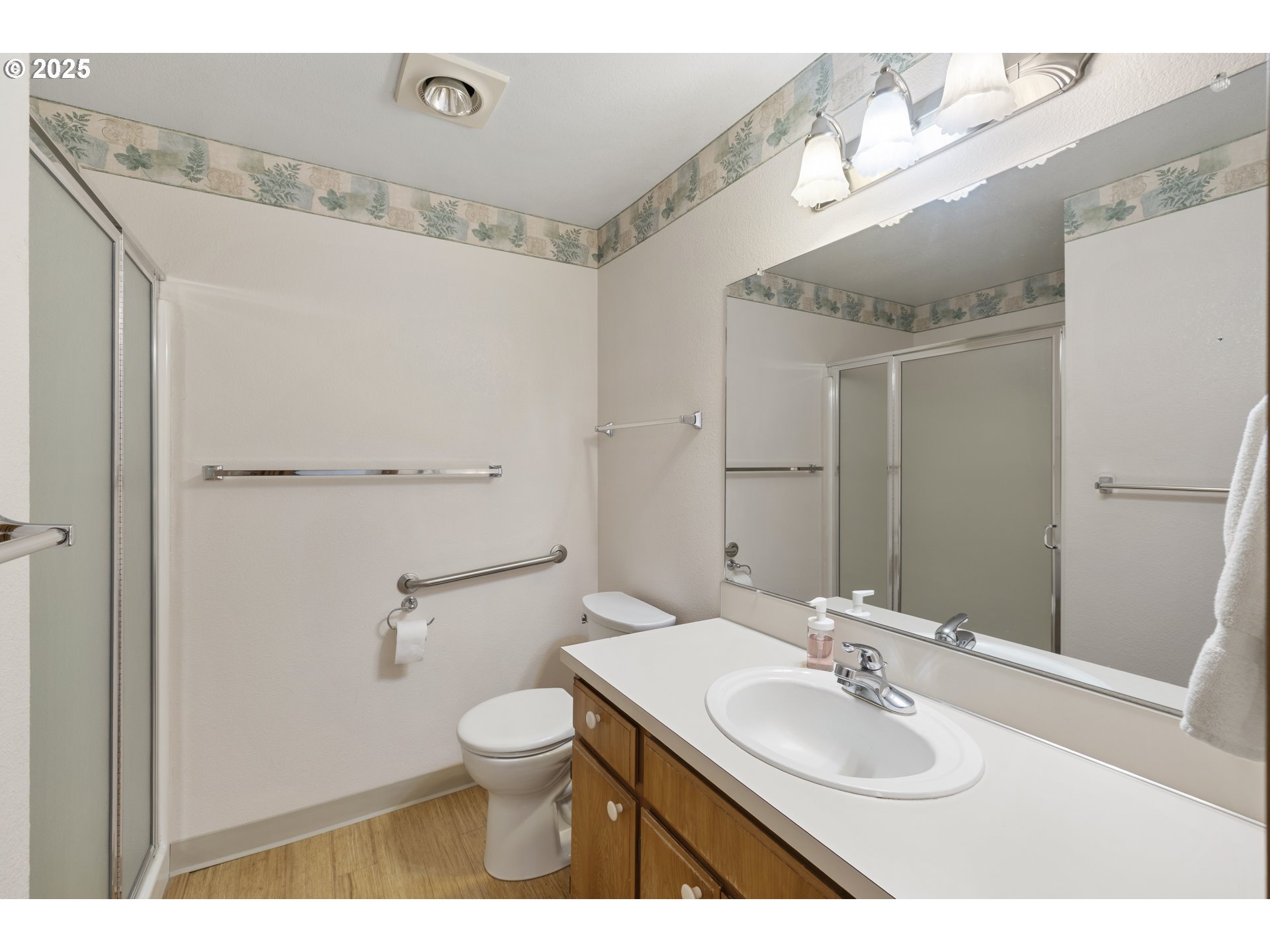 1609 Johnson Drive Newberg, OR 97132 - Photo 32 of 41 a bathroom with a sink toilet a mirror and shower