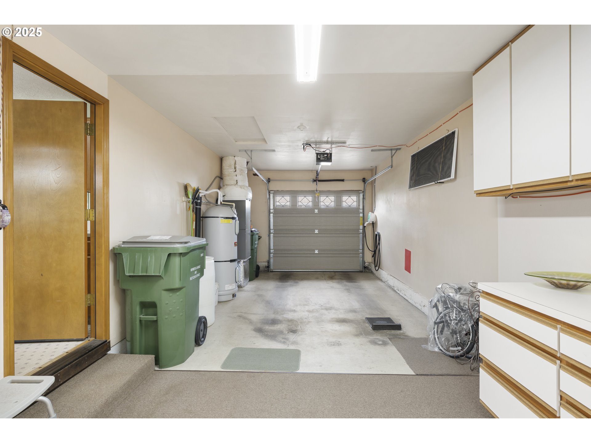 1609 Johnson Drive Newberg, OR 97132 - Photo 35 of 41 a kitchen with refrigerator and cabinets