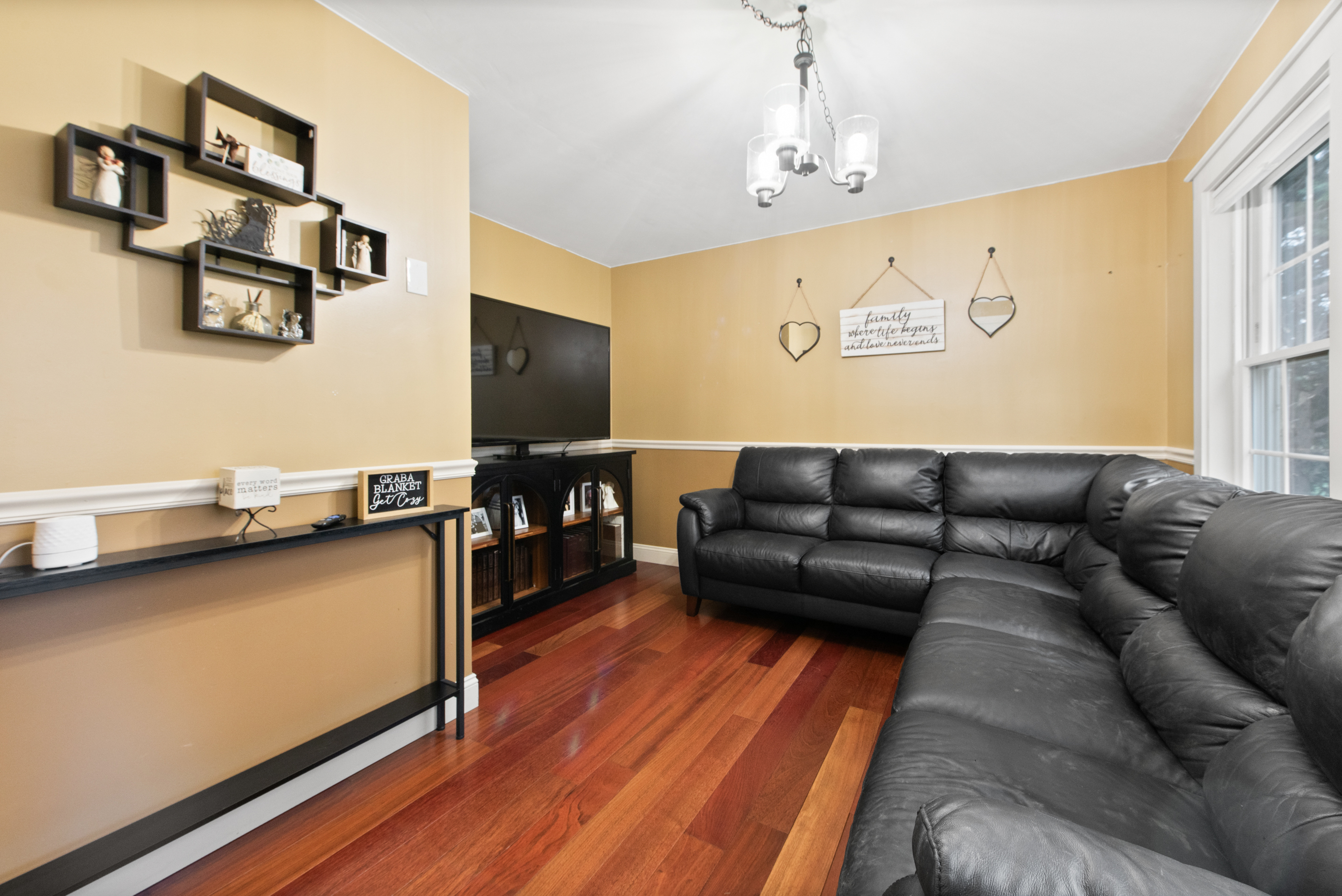 5 Race Track Hollow Middlefield, CT 06455 - Photo 13 of 40 a living room with furniture and wooden floor