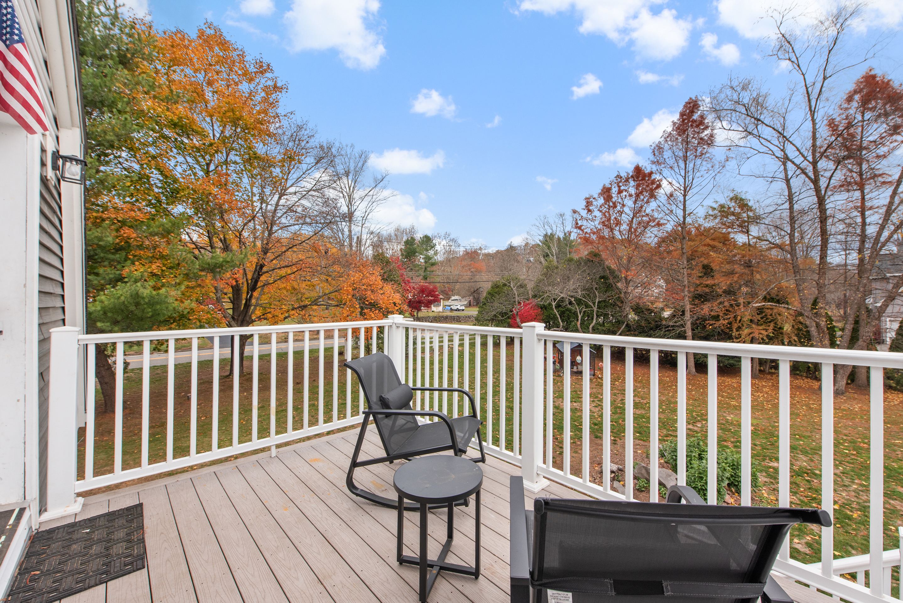 5 Race Track Hollow Middlefield, CT 06455 - Photo 32 of 40 a balcony with wooden floor and outdoor seating