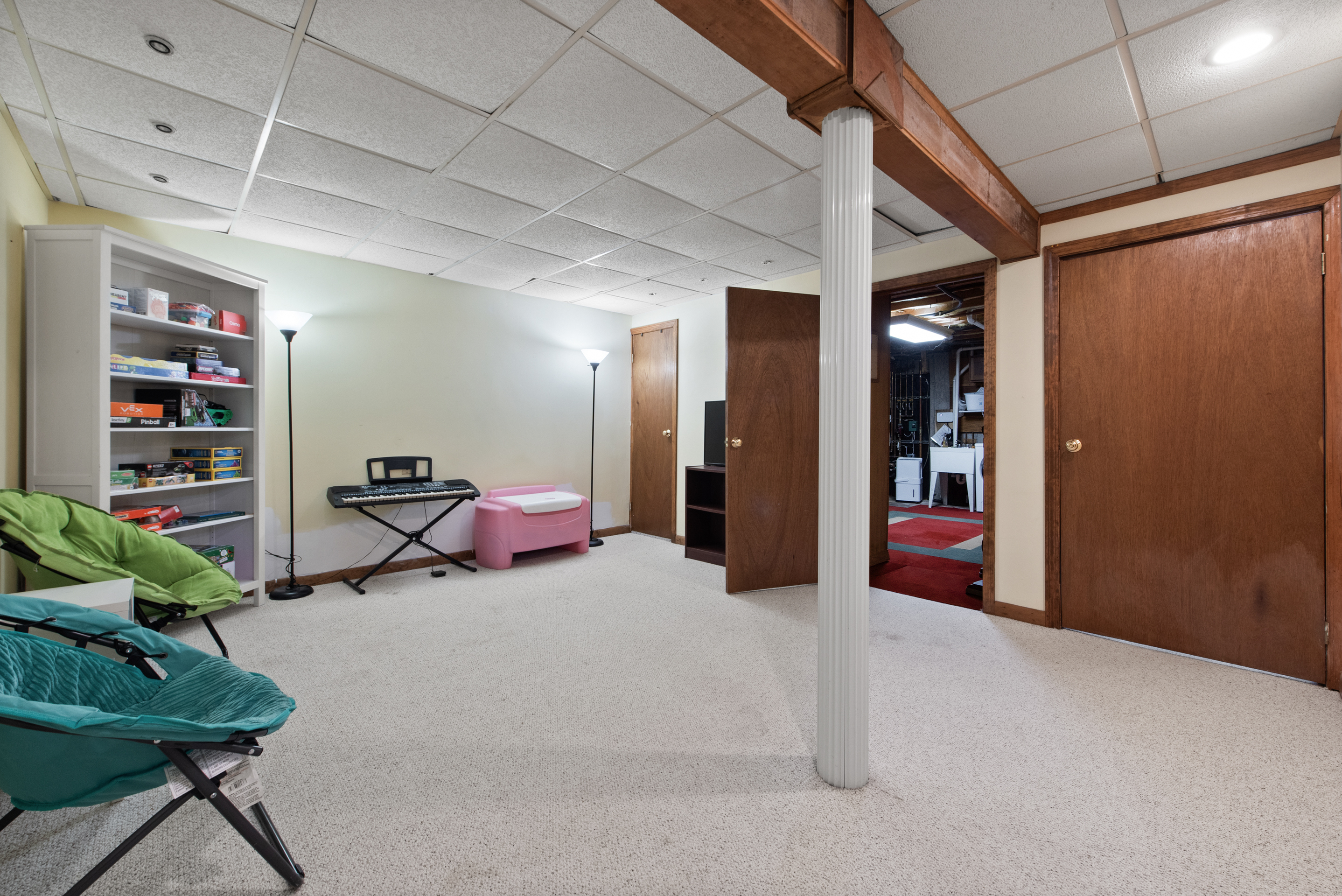 5 Race Track Hollow Middlefield, CT 06455 - Photo 37 of 40 a living room with lots of furniture and a chandelier
