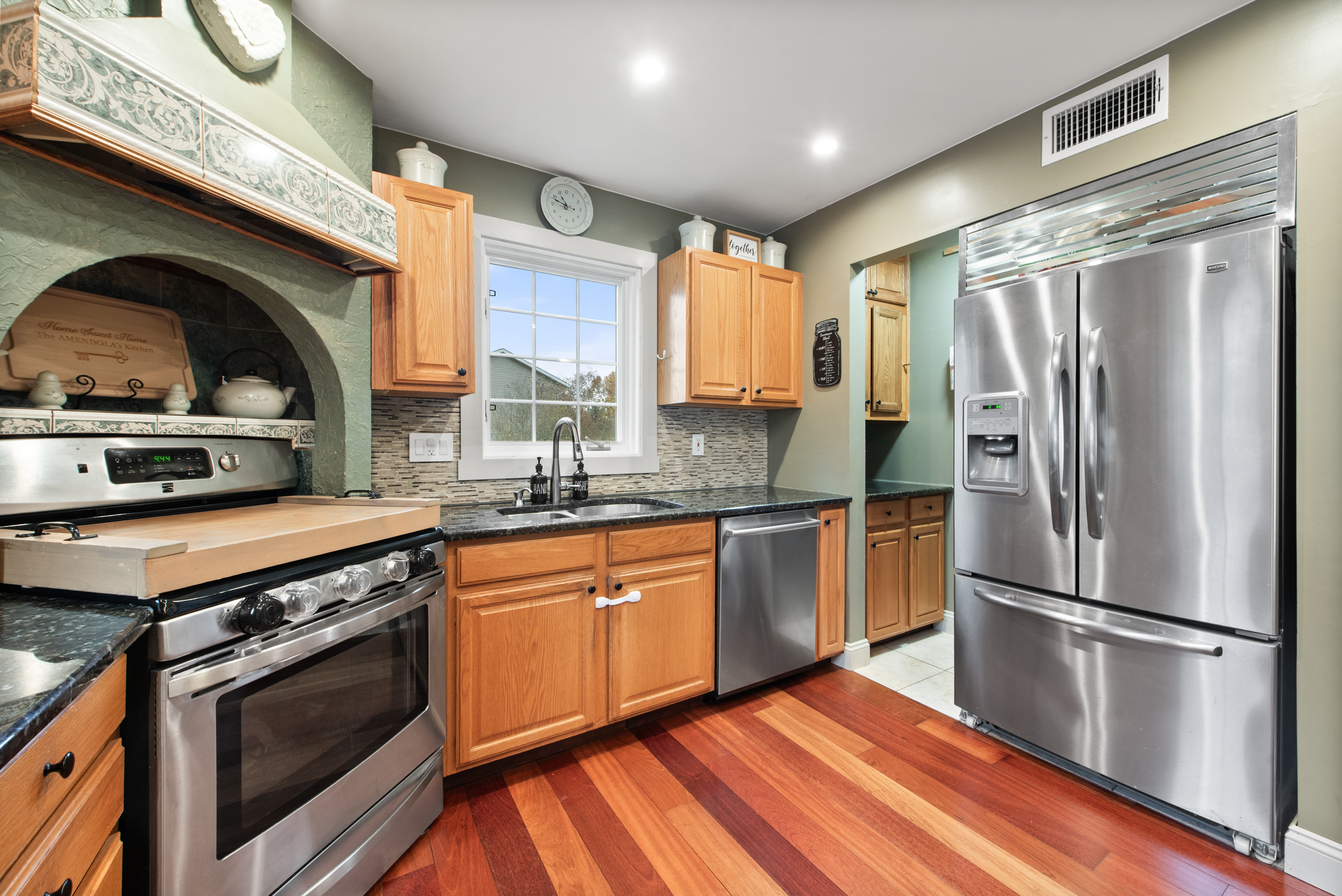 5 Race Track Hollow Middlefield, CT 06455 - Photo 8 of 40 a kitchen with stainless steel appliances granite countertop a refrigerator a sink dishwasher a stove and a refrigerator