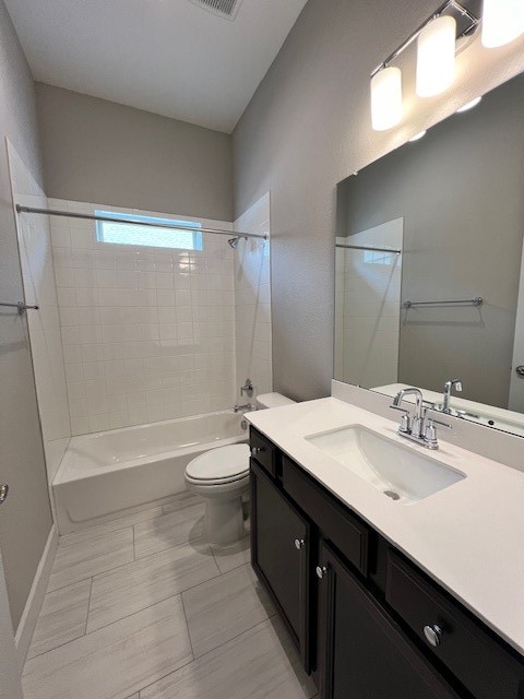 309 Buffalo Cave Road Georgetown, TX 78628 - Photo 16 of 22 a bathroom with a double vanity sink toilet and shower