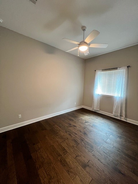 309 Buffalo Cave Road Georgetown, TX 78628 - Photo 17 of 22 a view of an empty room with window and wooden floor