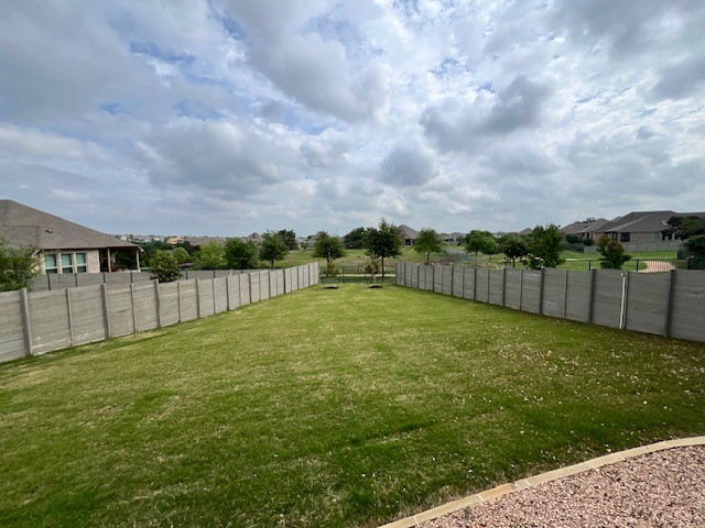309 Buffalo Cave Road Georgetown, TX 78628 - Photo 20 of 22 a view of a backyard