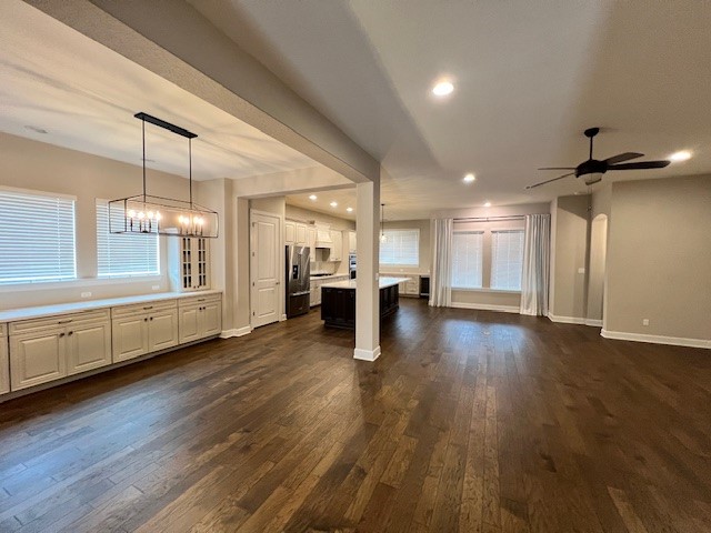 309 Buffalo Cave Road Georgetown, TX 78628 - Photo 4 of 22 a view of a room with wooden floors and windows