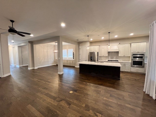 309 Buffalo Cave Road Georgetown, TX 78628 - Photo 5 of 22 a view of kitchen with kitchen island and stainless steel appliances