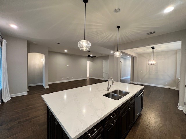 309 Buffalo Cave Road Georgetown, TX 78628 - Photo 9 of 22 a kitchen with kitchen island stainless steel appliances a sink and wooden floor
